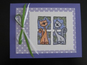 handstampedgreetingcardcatsinwindow